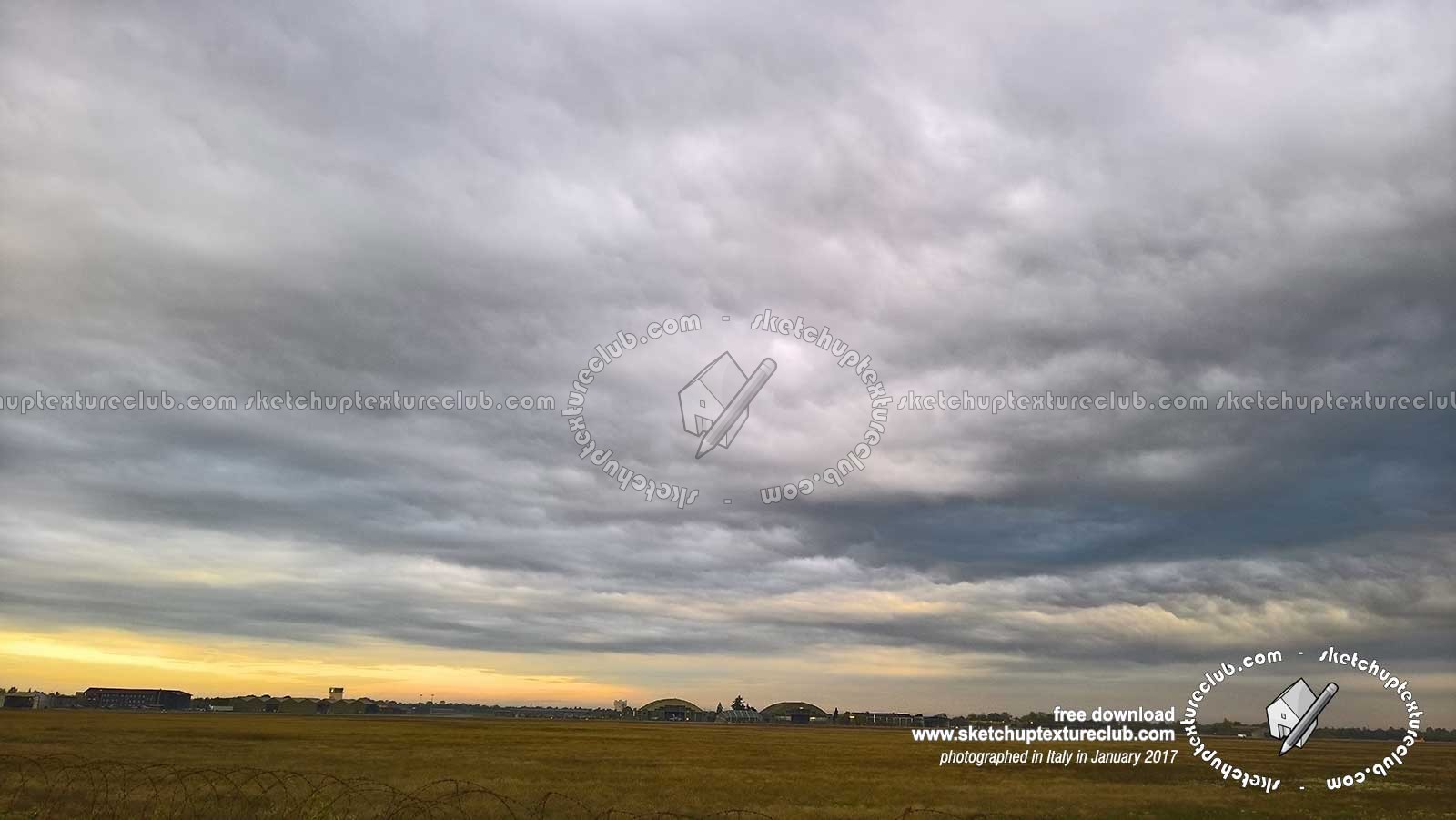 Textures   -   BACKGROUNDS & LANDSCAPES   -   NATURE   -   Countrysides & Hills  - Winter sunrise in the countryside with cloudy sky and hangars 20424