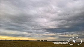 Textures   -   BACKGROUNDS &amp; LANDSCAPES   -   NATURE   -   Countrysides &amp; Hills  - Winter sunrise in the countryside with cloudy sky and hangars 20424